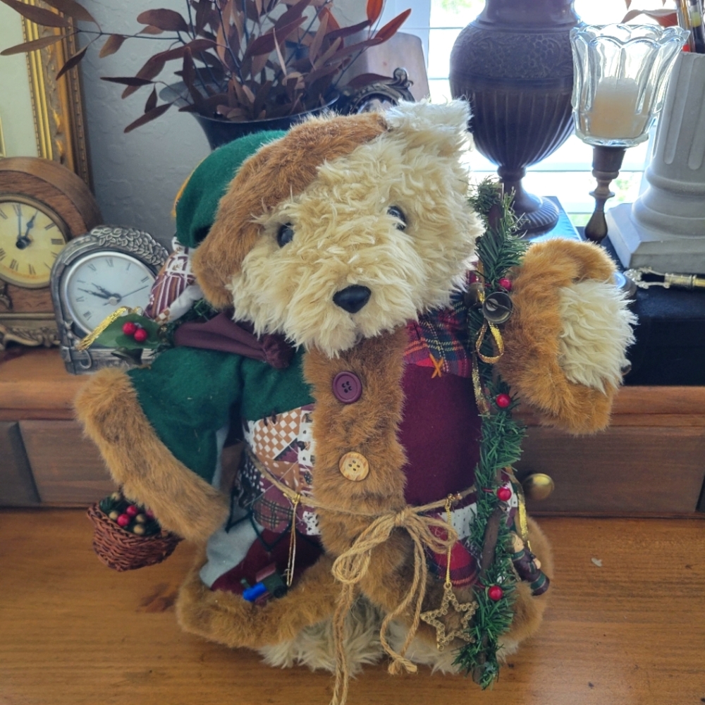 Patchwork decorative Santa teddy bear with bag of toys and staff.